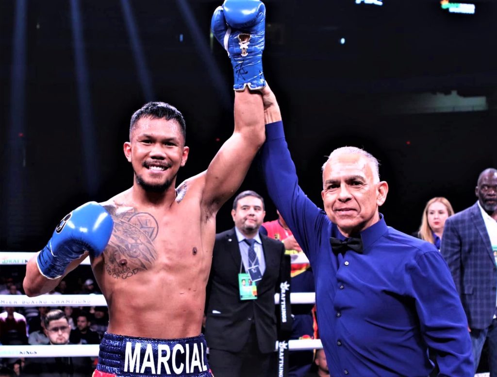 Referee Mark Calo Oy raises the hands of Eumir Marcial after the latter won by a 2nd round TKO against Ricardo Villalba in Texas. | Photo from Marcial's Facebook page