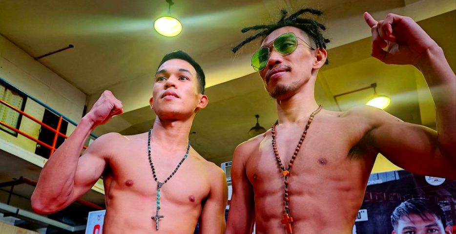 Regie Suganob (left) and Mark Vicelles strike a pose during the official weigh-in for Kumong Bol-Anon 9 in Tagbilaran City, Bohol. Suganob and Vicelles will battle for the IBF world light flyweight title eliminator in Calape, Bohol tomorrow. | Glendale Rosal