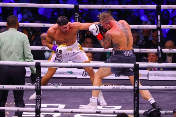 British reality TV star Tommy Fury fights against US YouTuber Jake Paul during a boxing match held at Diriyah in Riyadh on February 27, 2023. (Photo by Fayez Nureldine / AFP)