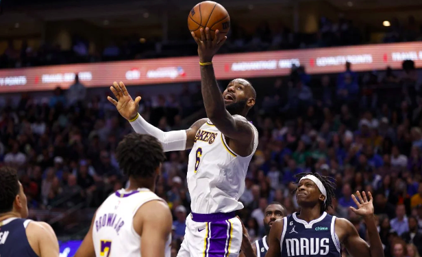 LeBron James #6 of the Los Angeles Lakers puts up a shot and scores against the Dallas Mavericks in the second half at American Airlines Center on February 26, 2023 in Dallas, Texas. The Lakers won 111-108. Ron Jenkins/Getty Images/AFP 