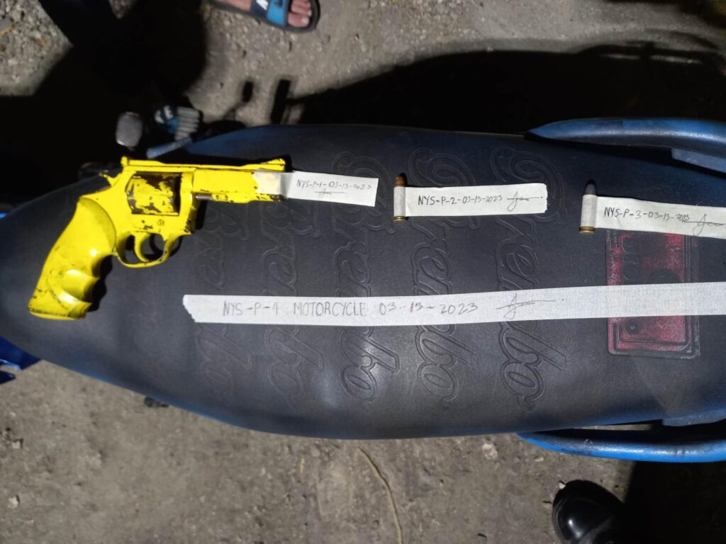 A joint police team of Borbon and Tabogon towns arrest the suspect in the March 12 shooting of two men in Borbon and they also confiscated the weapon used in the attack -- a .38 caliber revolver. | Borbon Police Station via Paul Lauro