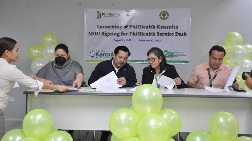 Representatives from Philhealth in Central Visayas and Bogo City government sign the memorandum of understanding to put up a Philhealth help desk in Bogo City for members of Philhealth in the city and nearby towns. | Contributed photo