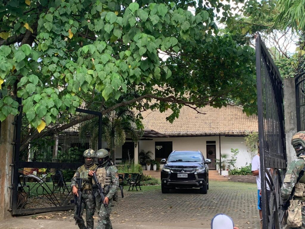 Operatives of the Criminal Investigation and Detection Group (CIDG) search the three houses in Bayawan City in Negros Oriental, one of which was the house of Congressman Arnolfo "Arni" Teves and the houses of two of what is believed to be relatives of the congressman. | Pegeen Maisie Sararaña