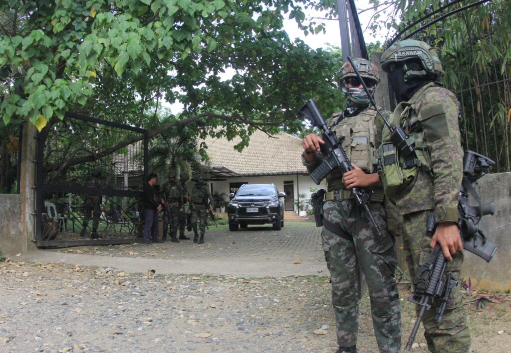 Operatives of the Criminal Investigation and Detection Group (CIDG) search the three houses in Bayawan City in Negros Oriental, one of which was allegedly the house of Congressman Arnolfo "Arni" Teves while the authorities believe that the two other houses searched by the authorities are believed by the CIDG to be owned by relatives of the congressman. | Contributed photo by Ferdinand Edralin