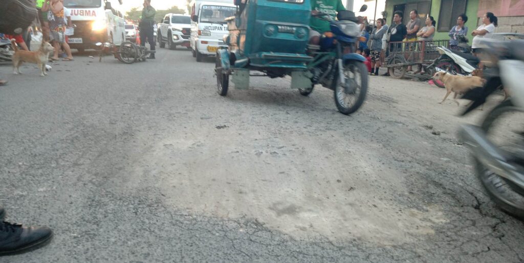 This is the small pothole that Jimmy Fernandez avoided by swerving to the other lane and hitting another motorcycle in the opposite lane instead. | Paul Lauro 
