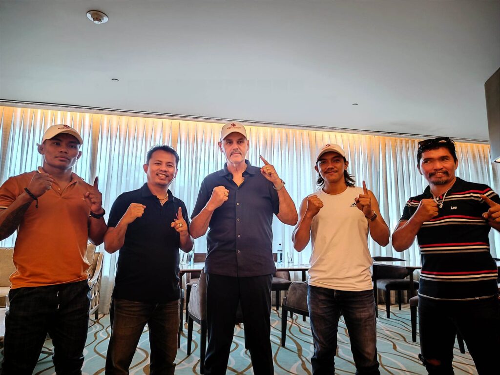 Christian Faust (third from left) shares plans of Money Punch Boxing Promotions in developing boxing in Cebu during an interview in a hotel in Mandaue City. With him are Niño Rio Saoy, Edito Villamor, Andel Roland, and Pepito Balansag of Money Punch Boxing Promotions. | Glendale Rosal