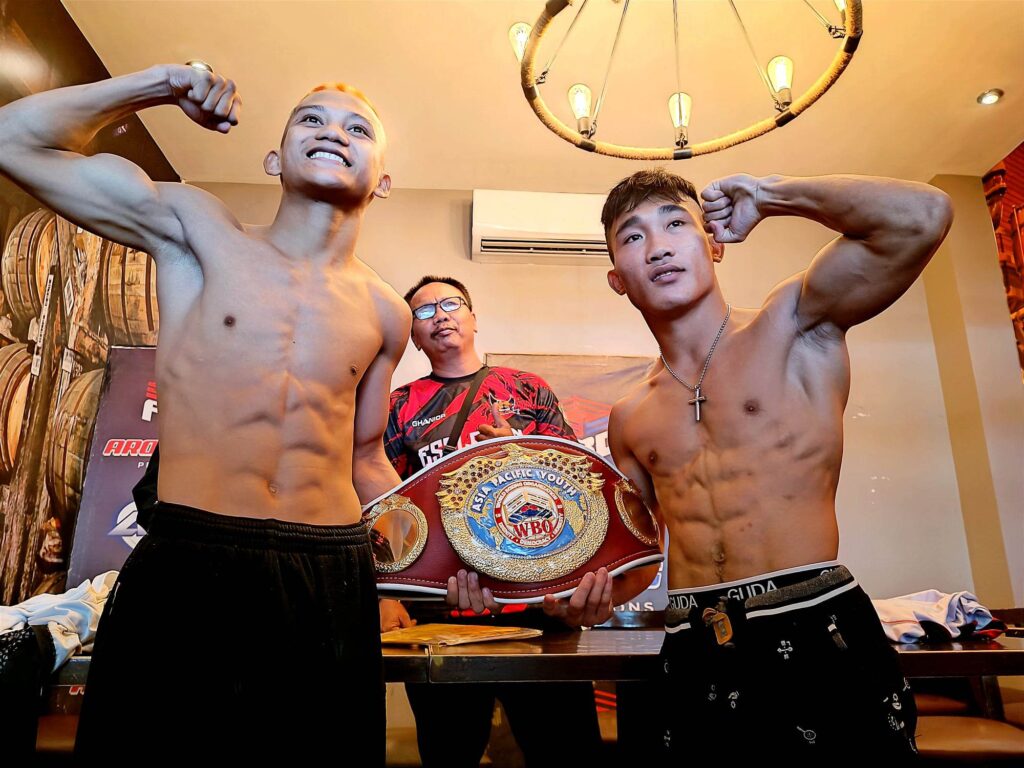 Engkwentro 9: Confident Gabunilas promises entertaining fight against Indonesia foe. John Paul Gabunilas (left) and Wandi Priman Hulu (right) hold the WBO youth title after passing their bout's weigh-in on Thursday, March 23. | Glendale Rosal
