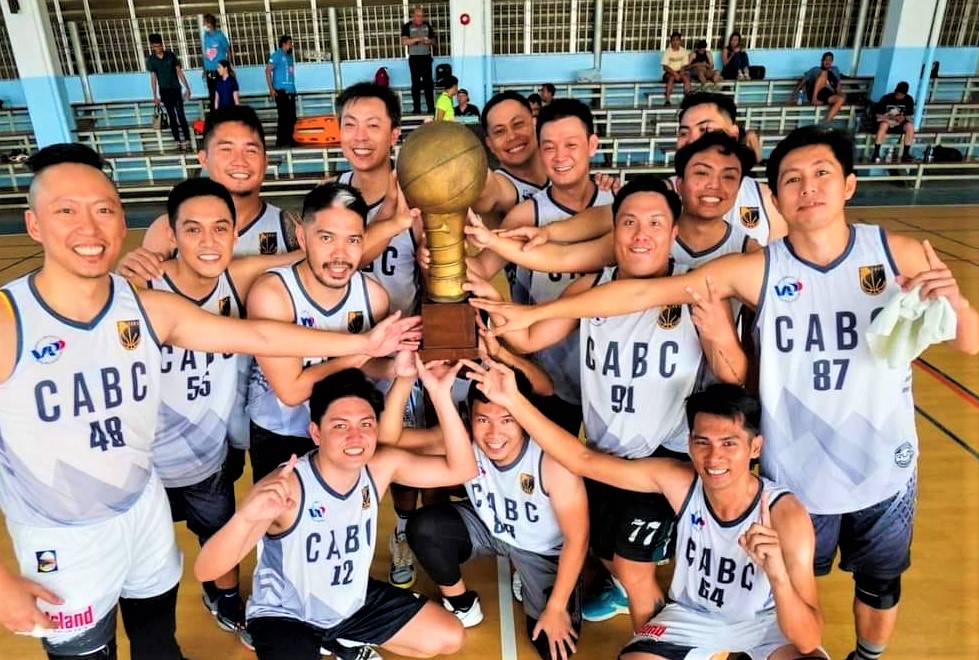 UAP-Sugbu Chapter-Max Bond players celebrate while holding the champion's trophy of the CABC Buildrite Cup 2023. | Contributed Photo