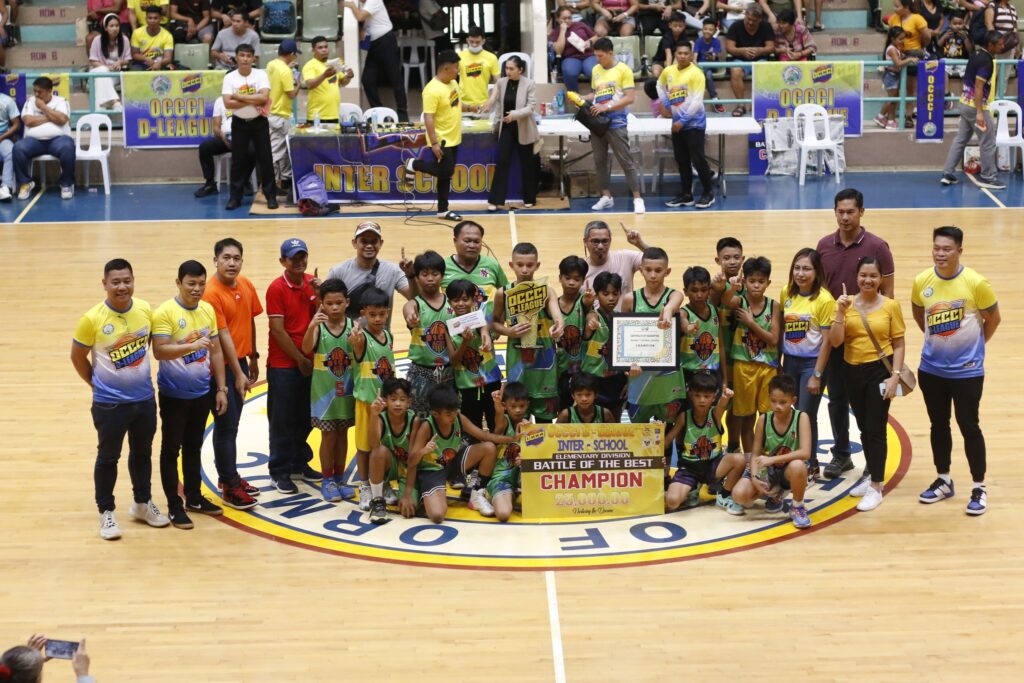 Baybay I Central School team poses for a group photo at center court after topping elementary division of the OCCCI D-League Interschool Basketball Tournament : Battle of the Best. | Photo from OCCCI D-League