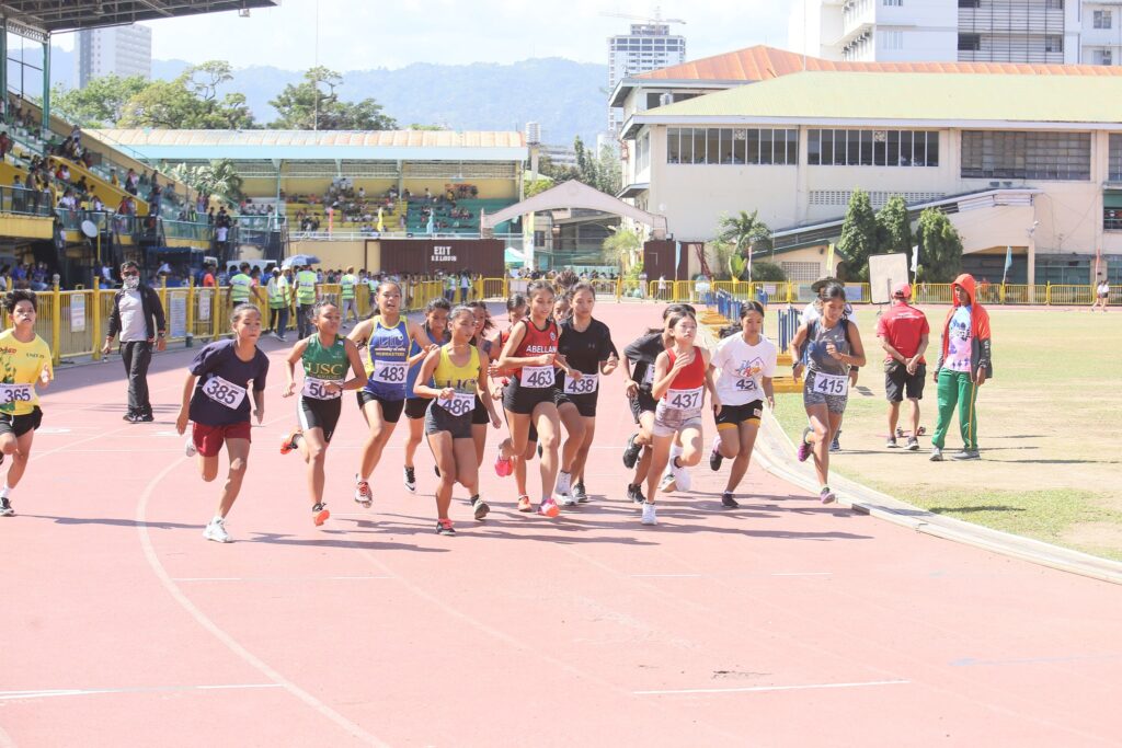 Runners make their way during the secondary girls 800-meter run of the 30th Cebu City Olympics last March 26 at the Cebu City Sports Center (CCSC) oval. | Photo from Sugbuanong Kodaker