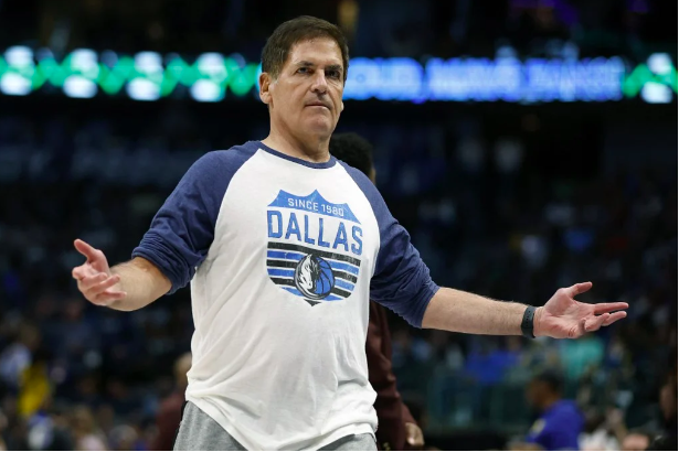 Dallas Mavericks owner Mark Cuban reacts during a timeout in the game against the Golden State Warriors at American Airlines Center on March 22, 2023 in Dallas, Texas. Tim Heitman/Getty Images/AFP