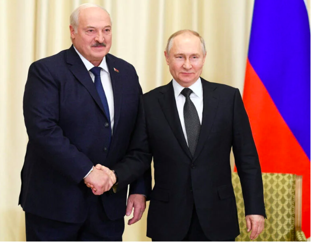 Russian President Vladimir Putin shakes hands with Belarusian President Alexander Lukashenko during a meeting at the Novo-Ogaryovo state residence outside Moscow, Russia February 17, 2023. (REUTERS)