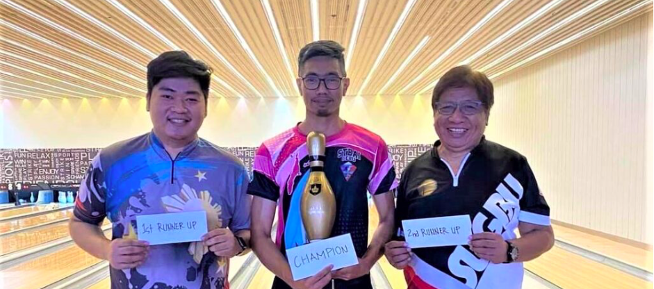 Luke Bolongan (center) is flanked by second placer Aui padawan (left) and Noli Valencia (right) during the awarding ceremony of the SUGBU Bowler of the Month tilt. | Contributed Photo