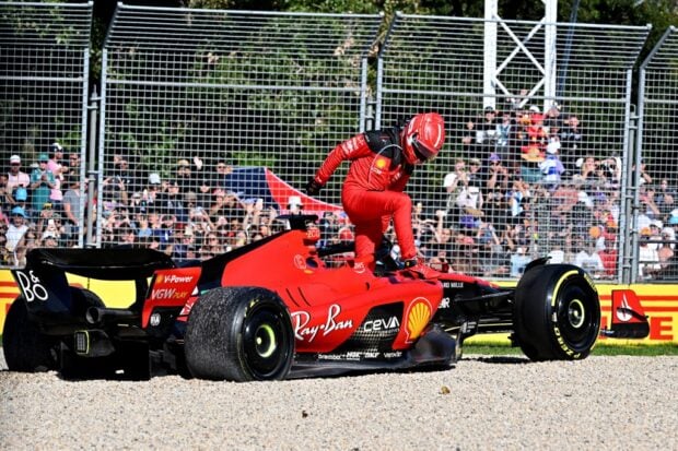 Ferrari’s Monegasque driver Charles Leclerc jumps out of the car after a crash during the 2023 Formula One Australian Grand Prix at the Albert Park Circuit in Melbourne on April 2, 2023.