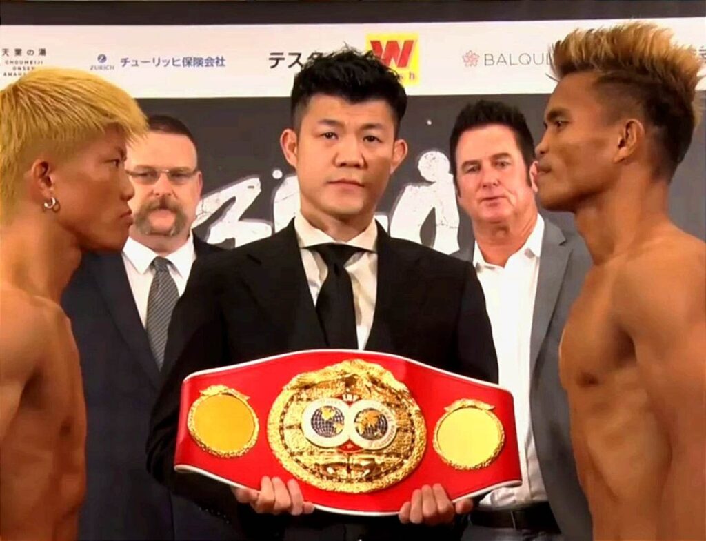 Rene Mark Cuarto (right) and Ginjiro Shigeoka (left) stares at each other during the weigh-in for their IBF interim world minimumweight title bout in Tokyo, Japan.