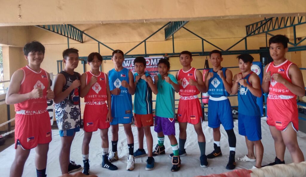 Boxers from Team Cebu City/Coach Gigil pose for a photo during the Cebu City Junior Olympics amateur boxing event at the Cebu City Sports Center (CCSC) boxing gym on Saturday, April 15, 2023. 