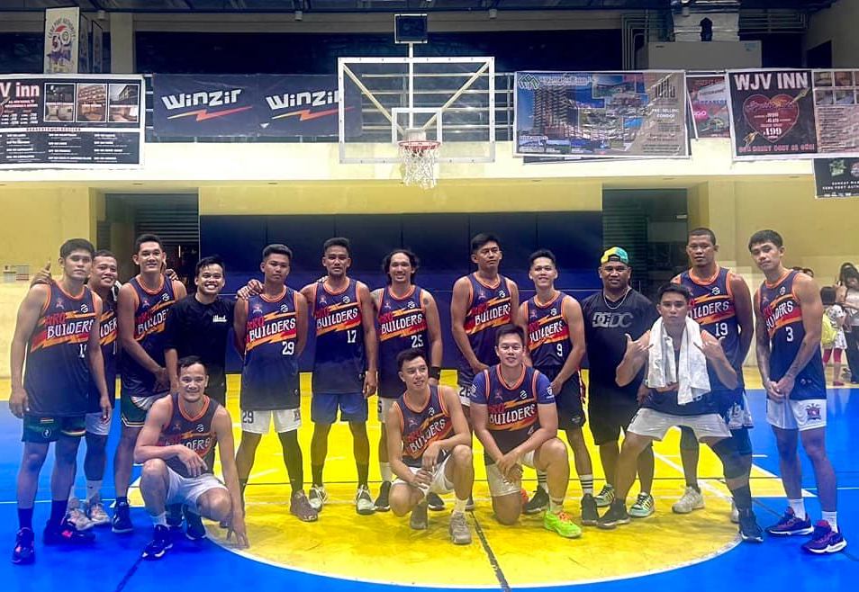 ARQ Builders basketball team pose for a group photo after their win in the MPBA basketball league.