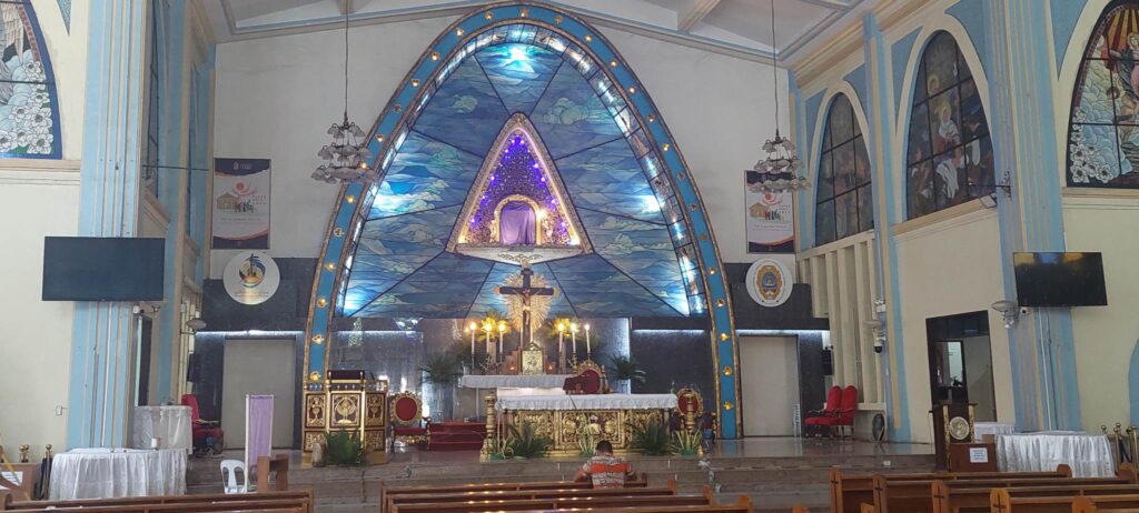 The image of the Virgin of the Rule or the Nuestra Señora de Regla Parish National Shrine is covered in purple cloth as the country celebrates Holy Week.