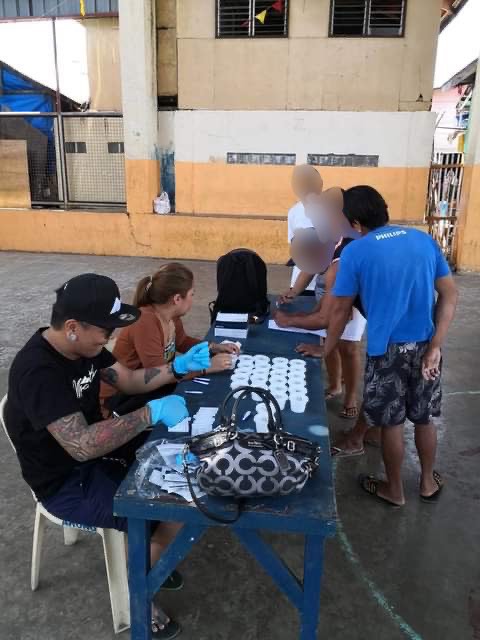 CLOSAP: 1 person who used drugs in Caubian found positive of drug use. IN PHOTO are some persons who used drugs (PWUDs) in Barangay Caubian wait for their turn to take a drug test before they will be enrolled in the Community-Based Drug Rehabilitation Program. | Futch Anthony Inso