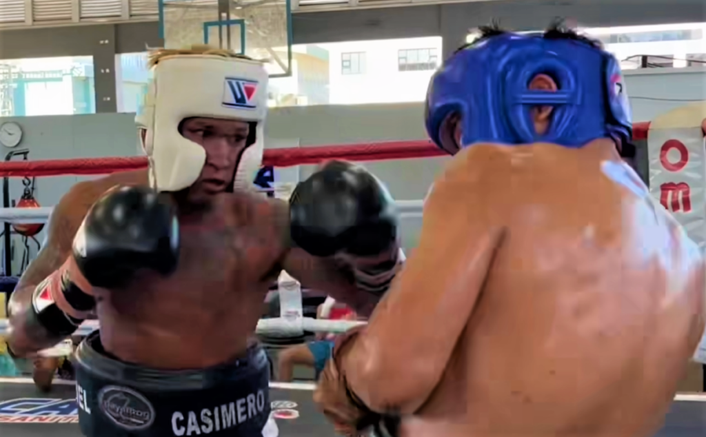 Former three-division world champion Johnriel Casimero (in white headgear) spars with Omega Boxing Gym's Pete Apolinar in a video uploaded to the former's Facebook page. | Screen grab Casimero's video