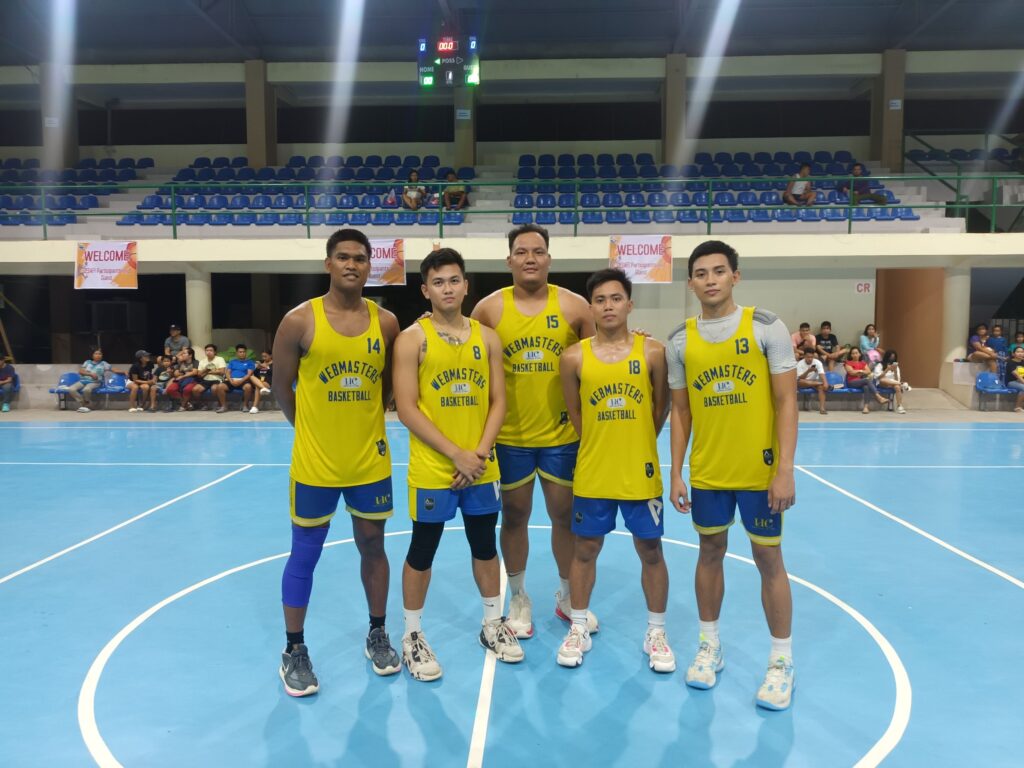 UC Webmasters' players pose at center court after being declared third place in the inaugural Mayor Inocentes Cabaron Invitational Inter-Collegiate Tournament on Sunday evening at the Moalboal sports complex in Moalboal town, south Cebu. | Contributed photo
