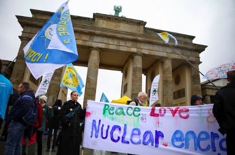 People take part in a protest against the shutdown of the last three German nuclear power plants, in Berlin, Germany, on April 15, 2023. (Photo by NADJA WOHLLEBEN / Reuters)