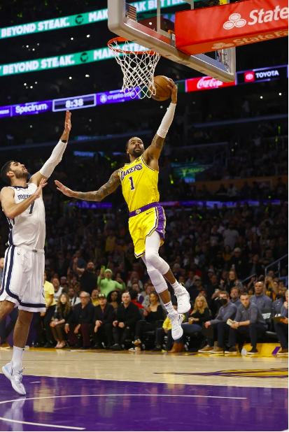 D’Angelo Russell #1 of the Los Angeles Lakers takes a shot against Santi Aldama #7 of the Memphis Grizzlies in the first half in Game Six of the Western Conference First Round Playoffs at Crypto.com Arena on April 28, 2023 in Los Angeles, California. Ronald Martinez/Getty Images/AFP