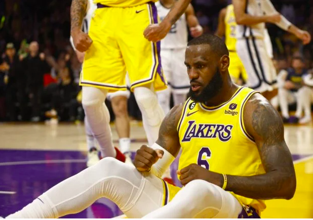 LeBron James #6 of the Los Angeles Lakers reacts after fouled by Xavier Tillman #2 of the Memphis Grizzlies in the first half in Game Six of the Western Conference First Round Playoffs at Crypto.com Arena on April 28, 2023 in Los Angeles, California. Ronald Martinez/Getty Images/AFP