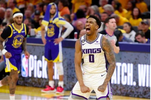 Malik Monk #0 of the Sacramento Kings reacts after making a basket in the second half Game Six of the Western Conference First Round Playoffs against the Golden State Warriors at Chase Center on April 28, 2023 in San Francisco, California. Ezra Shaw/Getty Images/AFP
