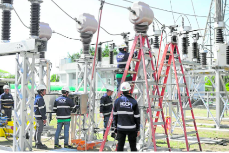 INSPECTION Personnel of the National Grid Corp. of the Philippines inspect one of its facilities in the Visayas on April 17, days before announcing a “system disturbance” in the Visayas grid.—NATIONAL GRID CORP. OF THE PHILIPPINES PHOTO