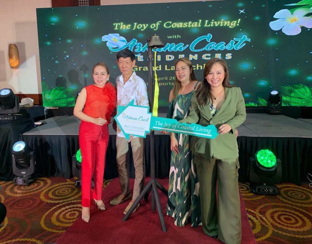 Contempo Property Holdings President and CEO Beverly Dayanan ceremonial handing over of key to first homeowners of Ashana Coast Residences