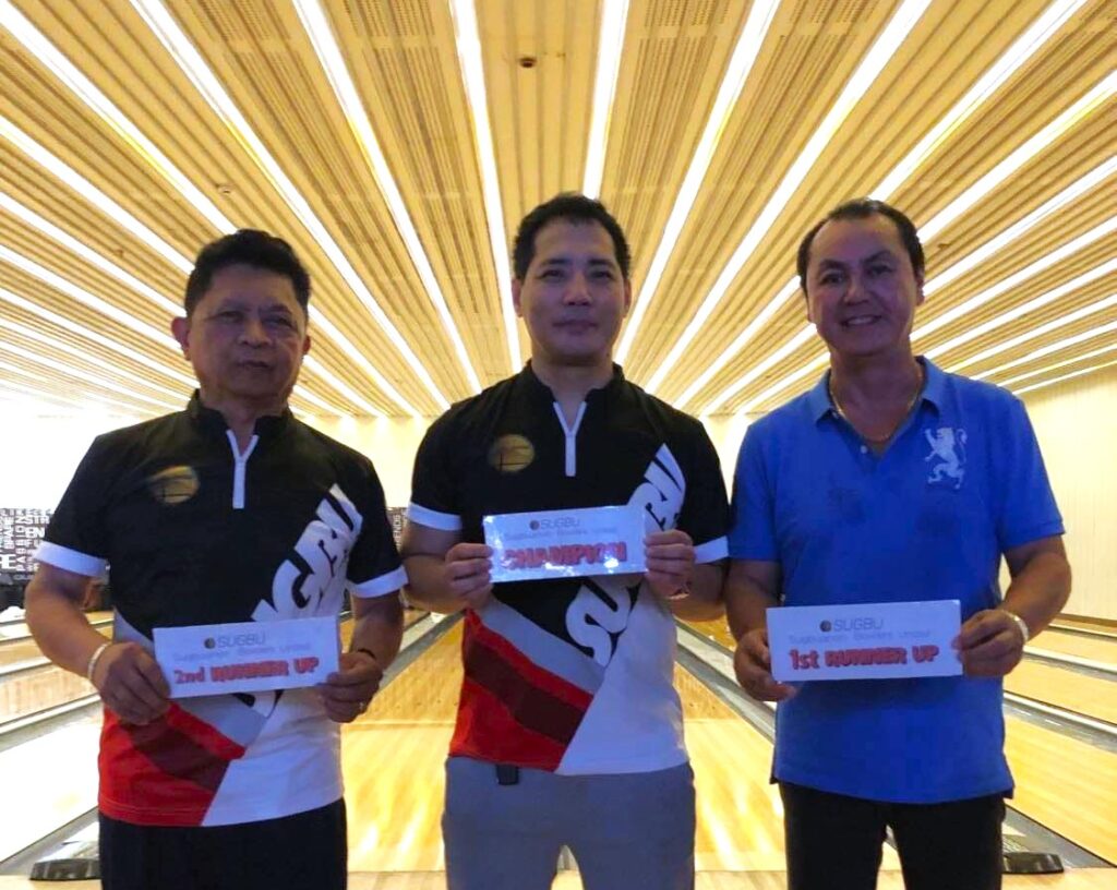 (From left to right) Danny Sabang, Ted Convocar, and Rene Ceniza, pose for a group photo after finishing as the top three bowlers in SUGBU's Bowling Shootout Tournament.