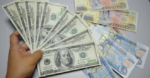 Photo showing dollar and peso bills.