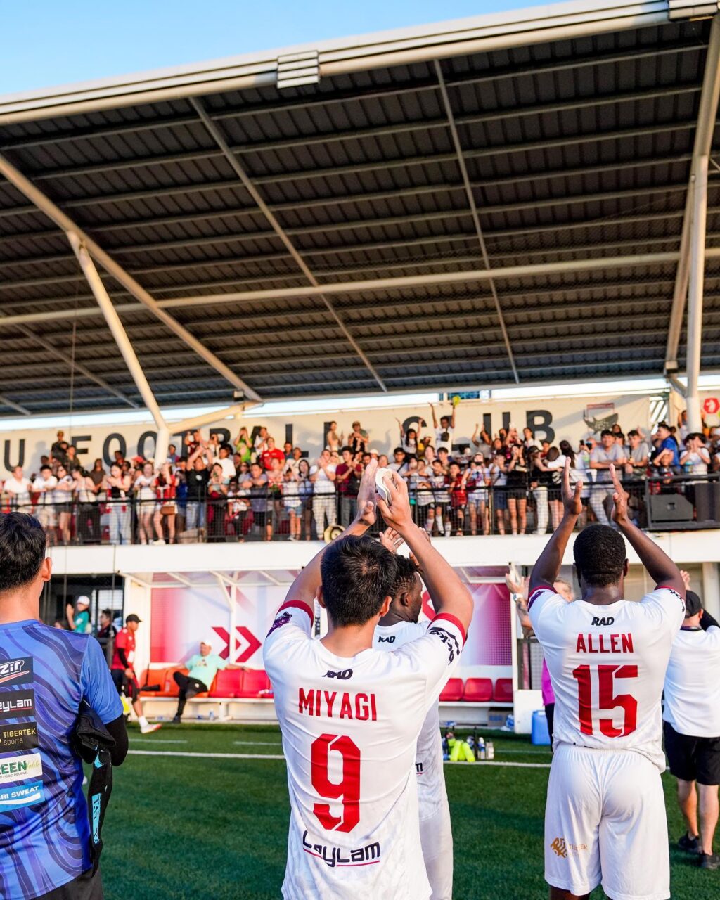 Cebu FC players applauding Cebuano football fans during one of their home matches at the Dynamic Herb-Borromeo Sports Complex.