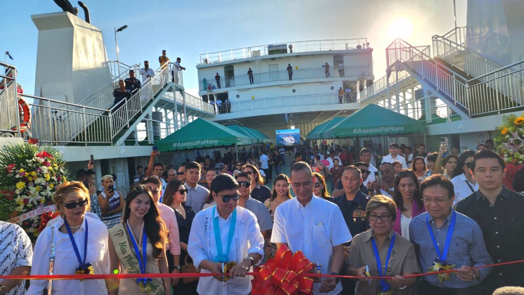 Lite Shipping Corporation President Lucio Lim Jr together with guest of honor Senator Raffy Tulfo and other distinguished guests cut the ribbon to inaugurate Lite Ferries' MV Lite Ferry Seven at the deck of the vessel on a clear day with other guests witnessing behind them