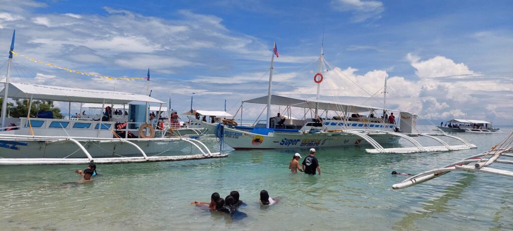 Tourists arrive at Barangay Caohagan in Olango Island to take their needed weekend break. | Futch Anthony Inso