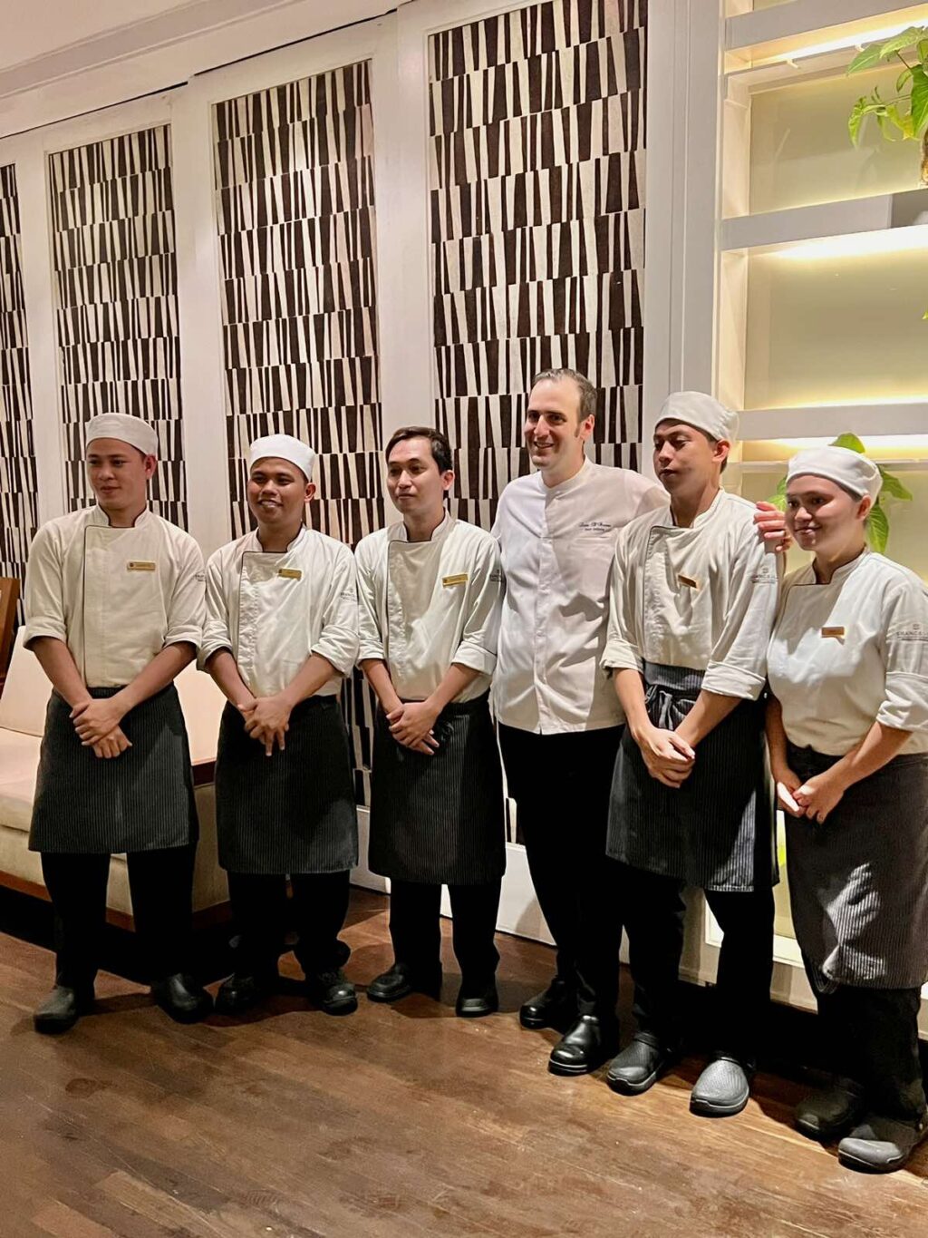Shangri-La Mactan Cebu’s new head Italian Chef, Luca D'Amora, poses with Acqua chefs.