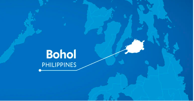 Karakol as a street dance of faith during Bohol’s Fiesta month of May. Photo is a map of Bohol.