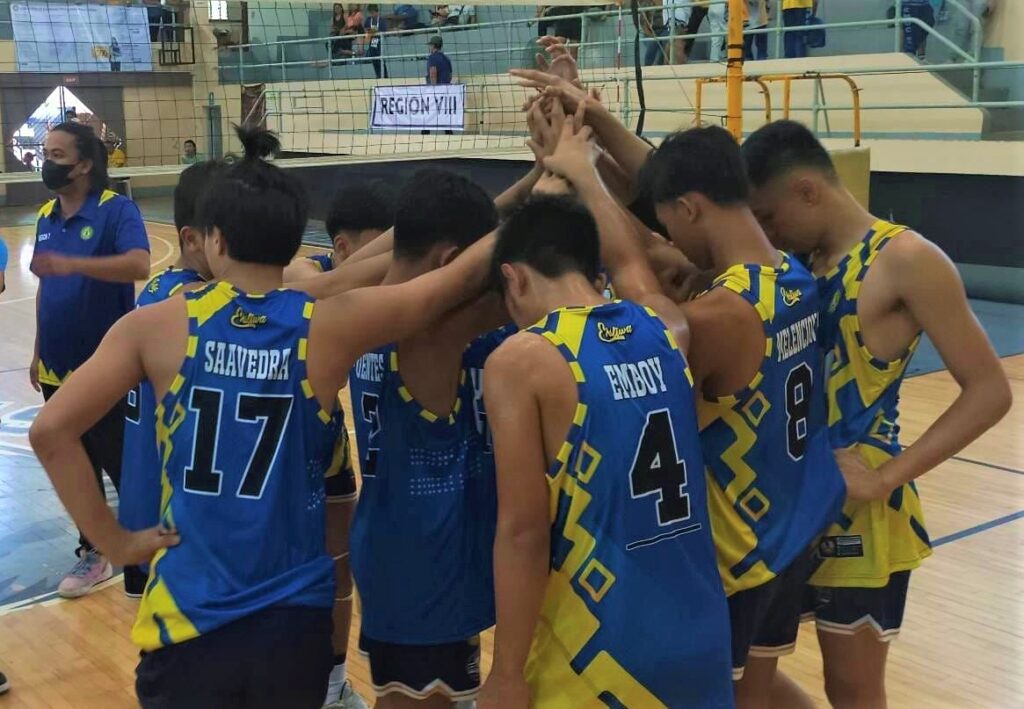 USP-F's secondary boys' volleyball team huddle up after beating Region 8 in the Palarong Pambansa Pre-Qualifying Cluster Meet at their homecourt in USP-F Lahug campus.