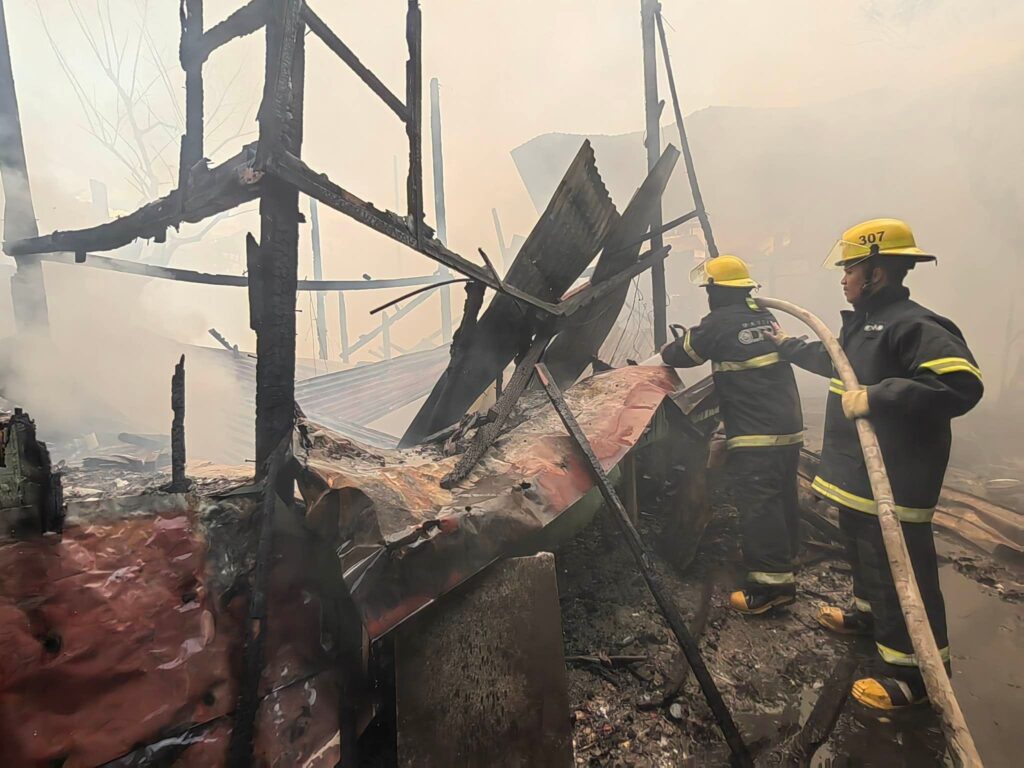 Firefighters put out a fire that hit a residential area in Barangay Jagobiao, Mandaue City.
