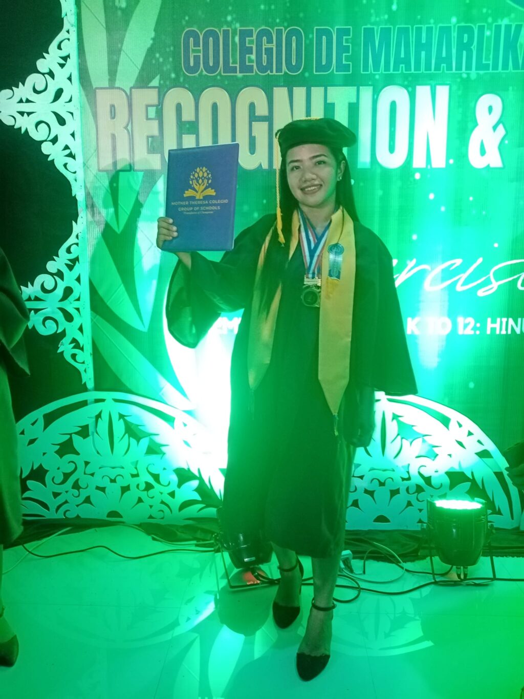 Honeylene Alindajao shares a photo from her senior high school graduation.