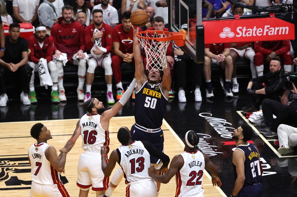 Aaron Gordon #50 of the Denver Nuggets drives to the basket during the fourth quarter against the Miami Heat in Game Four of the 2023 NBA Finals at Kaseya Center on June 09, 2023 in Miami, Florida. | Getty Images via AFP