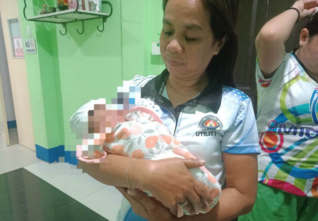 Newborn found alive in sack; mother thought baby dead