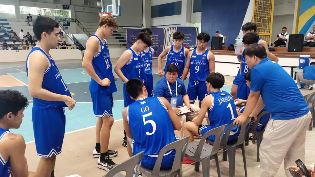  Magis Eagles, ANS advance to Palaro. SHS-AdC basketball team  players and coach are in a huddle during the Palarong Pambansa Pre-Qualifying Cluster Meet. | Photo from the Palarong Pambansa Pre-Qualifying Cluster Meet Facebook page