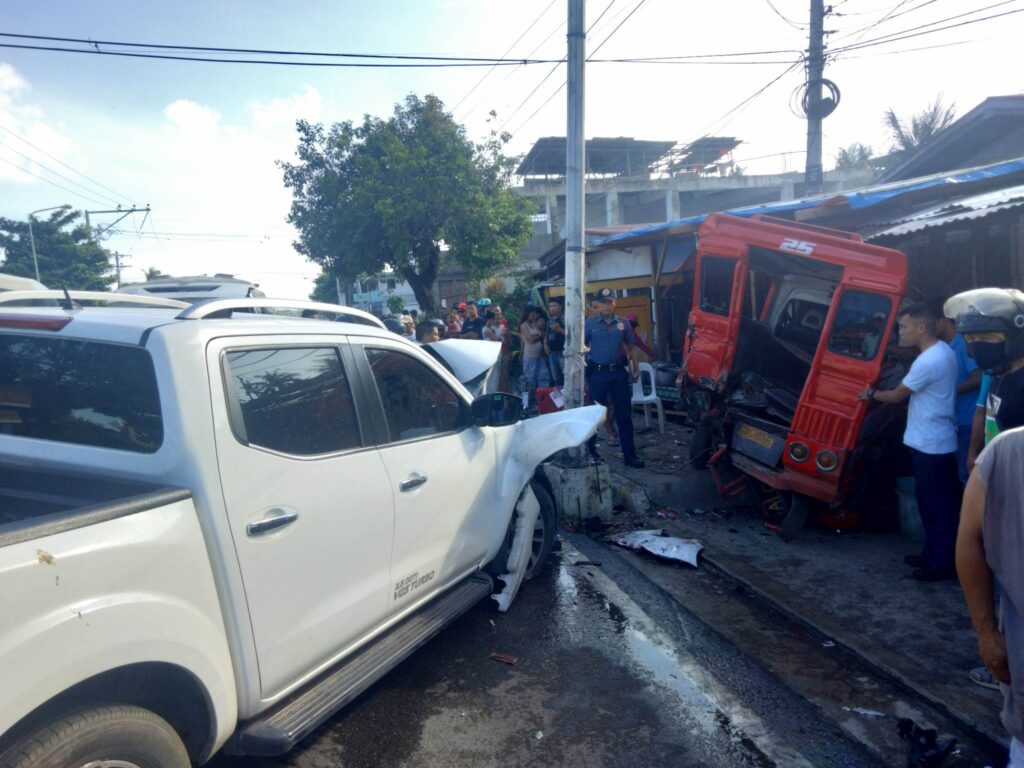 Here is another angle showing the two vehicles -- the pickup and the PUJ. | Paul Lauro