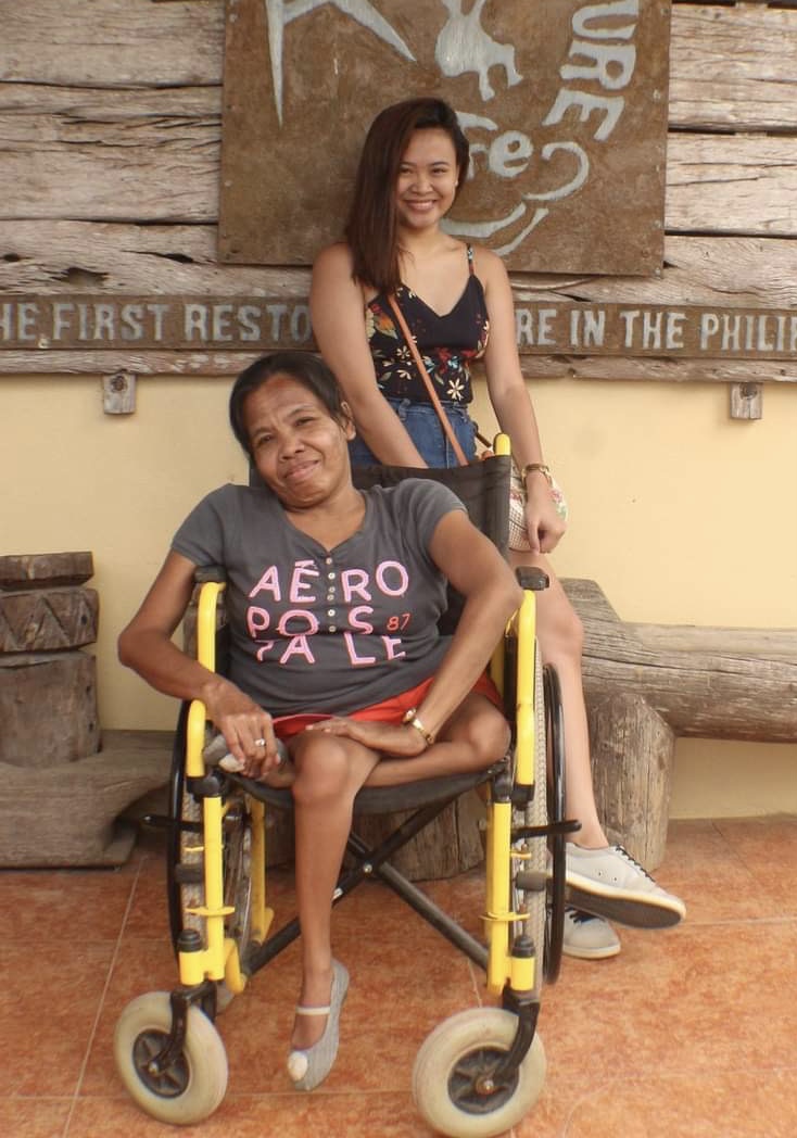 Polio survivor shows that fatherhood is not defined by bloodlines or gender but by love. Ate Bulilit is with her niece, Chiarra Dale Maambong. | Ma. Cristina Maambong