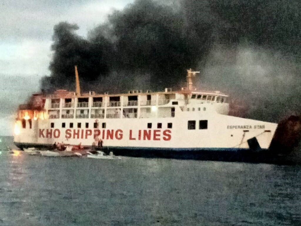 Ship fire in Bohol. Fishermen help in rescuing the passengers and crew of the burning ship early this morning, June 18, off the coast of Panglao town in Bohol Province. | PCG Bohol