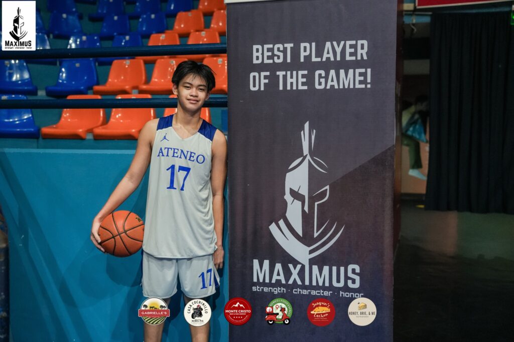 Henry Kristoffer Suico poses for a photo after being named the player of the game in a tournament in Manila.