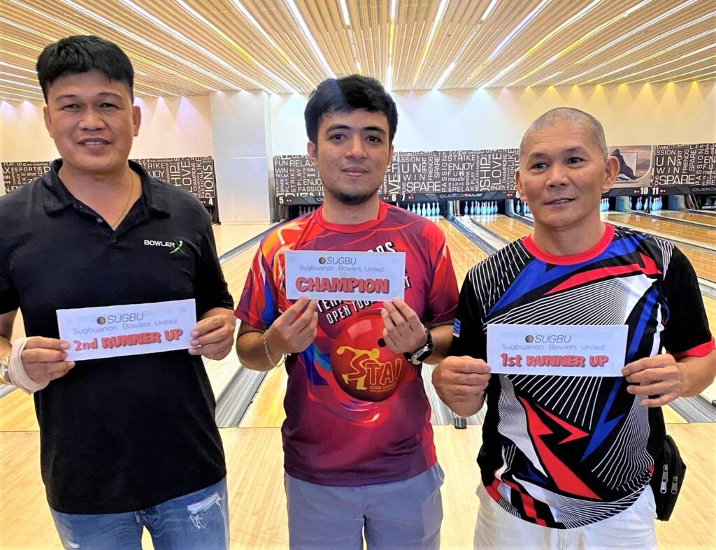 John Galindo (middle) joins fellow bowlers Roger Asumbrado (right) and Rommel Calipay (left) during the SUGBU Bowling Shootout tournament.