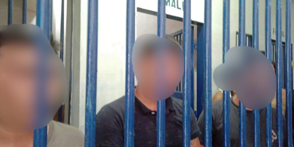 Three men, who were caught fighting inside a bar, are behind bars at the Abellana Police Station this morning, July 8, 2023.